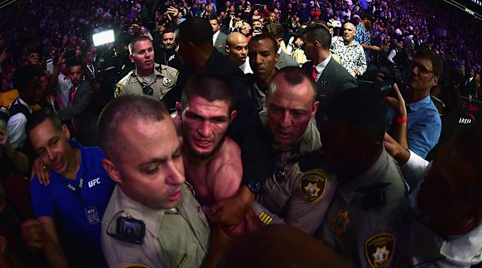 khabib-mcgregor-aftermath-khabib-escorted-off.jpg